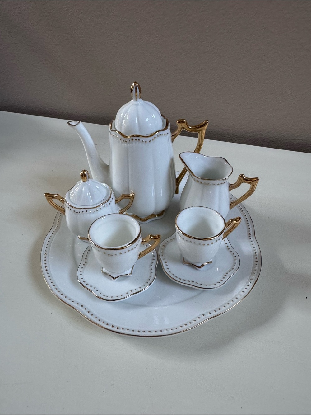 Elegant White Porcelain Mini Tea Set with Gold Trim